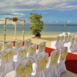 Beach DW Ceremony With Yellow Bows – Iberostar Rose Hall Beach – Horizontal